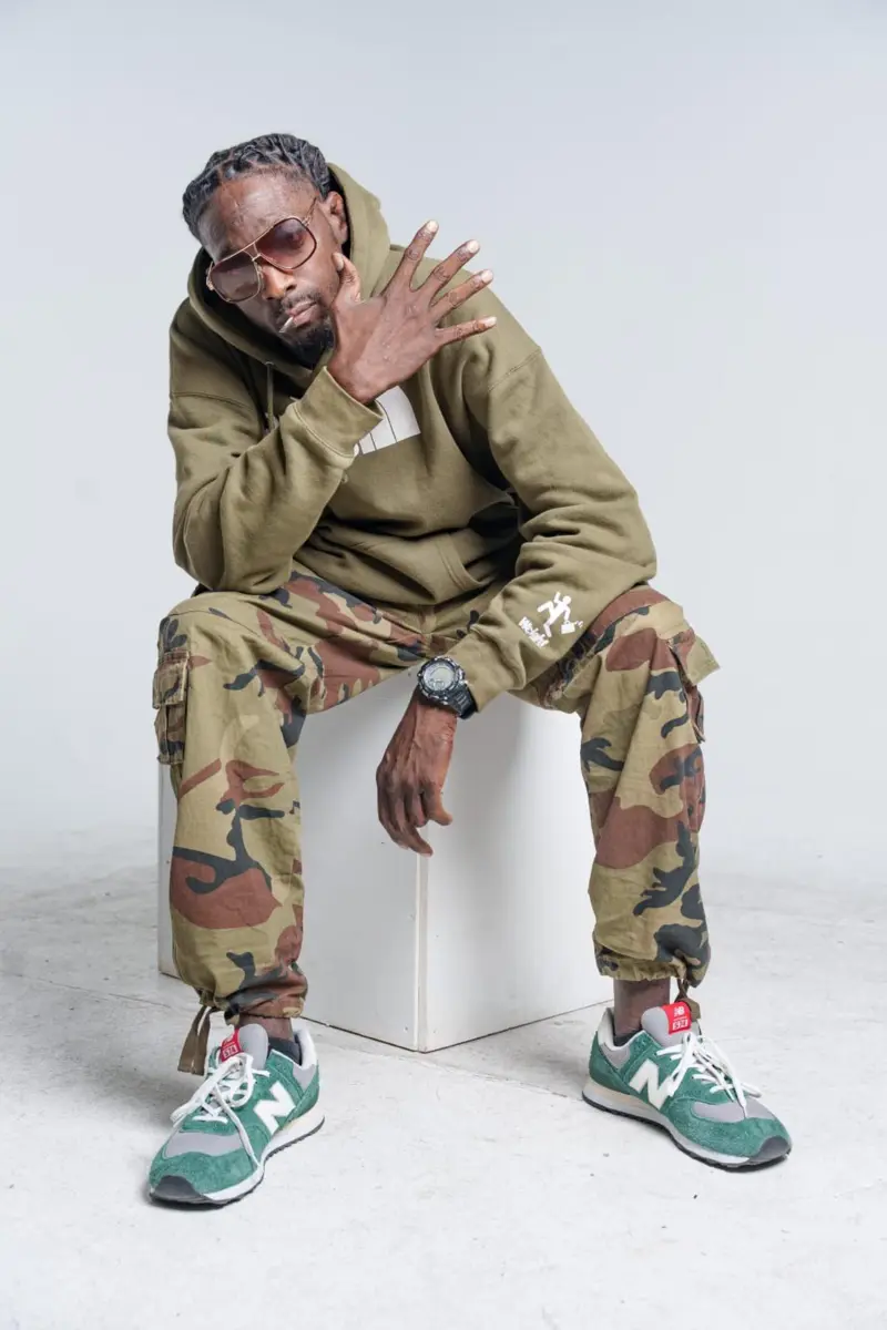 DJ Slimm in a studio portrait